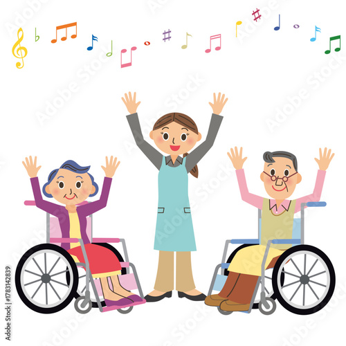 車椅子に座る老人と介護施設で音楽を楽しむ