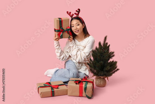 Young Asian woman in reinde...