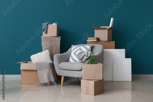 Armchair with cardboard box...