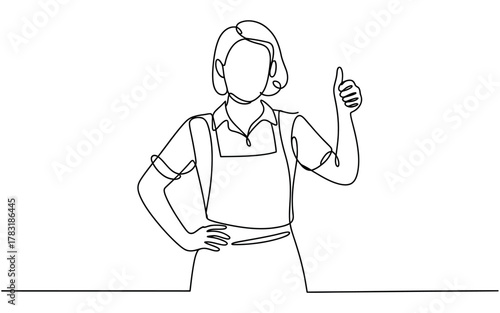 A person in an apron gives a thumbs-up gesture with a confident pose.
