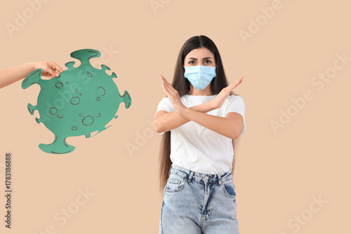 Young woman in medical mask...