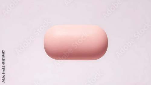 Minimalist pink soap bar floating on white background