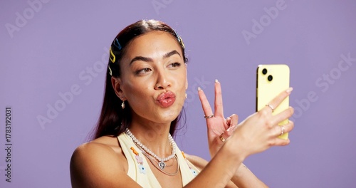 Bild auf Leinwand Beauty, peace sign and selfie with influencer woman in studio for product review on social media