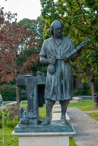 Wallpaper Mural Bronze statue of Antonio Stradivarius violin maker in Piazza Marconi Cremona Italy a historical landmark representing fine craftsmanship and musical heritage Torontodigital.ca
