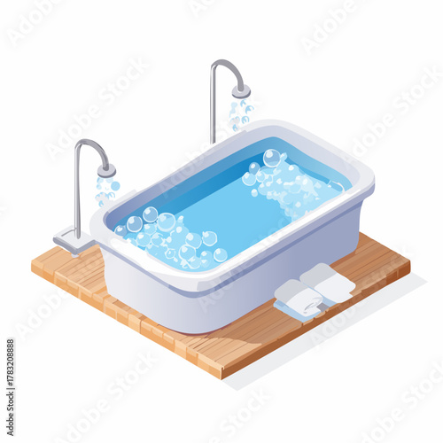 Bathtub with bubbles and towels on wooden mat