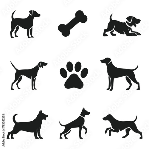 vector set of dog silhouettes with paw and bone