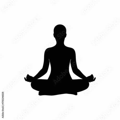 silhouette of a young woman in yoga meditation position