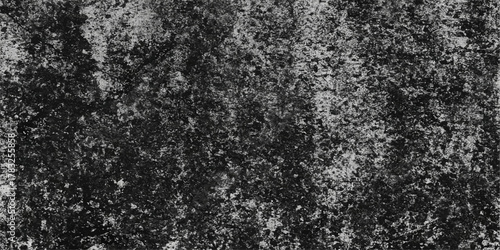 Rough gray asphalt texture background with a black and white grunge pattern on the concrete surface