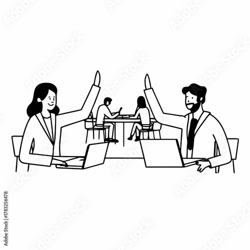 Successful business people giving each other a high five while working on laptop in coworking