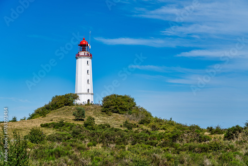 Fototapeta Naklejka Na Ścianę i Meble -  A view of the lighthouse from the island of Hiddensee on the Baltic Sea
