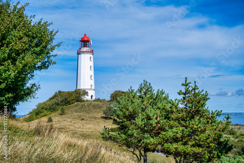 Fototapeta Naklejka Na Ścianę i Meble -  A view of the lighthouse from the island of Hiddensee on the Baltic Sea