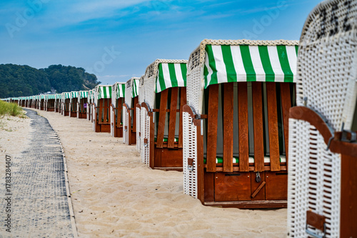 A view of the beach and the beach chairs in Baabe