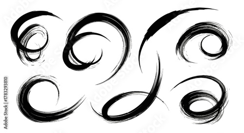 A collection of abstract black brush stroke swirls and curves on a white background, evoking a sense of movement and artistic expression.