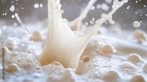 Wallpaper Mural High resolution closeup of swirling milk splashing dynamically in bright white scene Torontodigital.ca