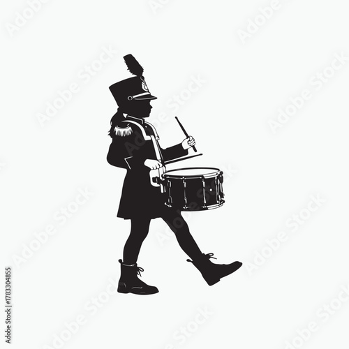 Silhouette of a marching band drummer