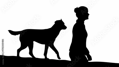Silhouette of a woman and her dog walking together, perfect for representing companionship, outdoor activities, and the bond between humans and animals