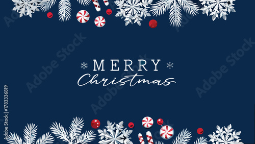 Elegant merry christmas greeting card with white snowflakes pine branches red baubles and candy canes on a navy blue background