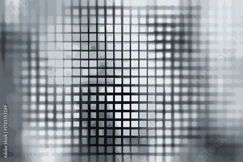 Composizione astratta con griglia a mosaico in scala di grigi e sfocatura artistica.