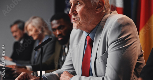 Obraz na plátně Press conference, speech and man with group for delegation, international government and panel
