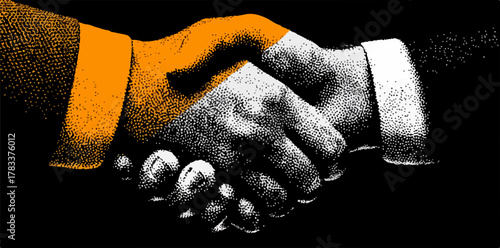 Dwie ręce ściskają się w geście porozumienia i współpracy, symbolizując sukces i partnerstwo w biznesie.