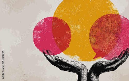 Dwie dłonie trzymające kolorowe dymki symbolizujące komunikację i dialog.