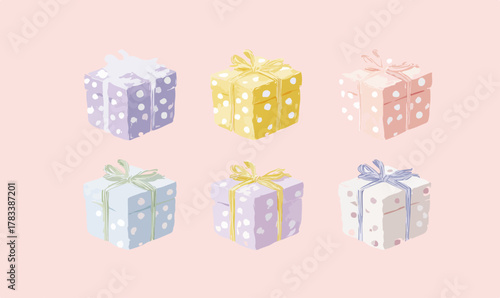 다채로운 색상의 선물 상자가 귀여운 도트 패턴과 리본으로 장식되어 있습니다.