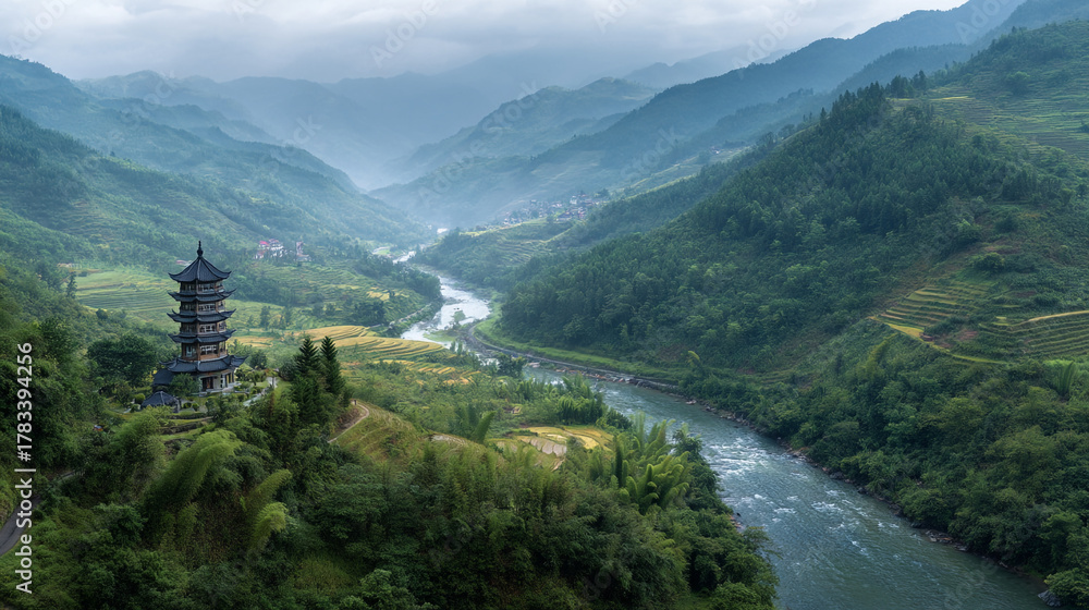 Naklejka premium Pagoda in a lush valley with a river winding through the landscape view