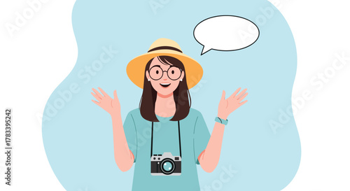 Happy female tourist with a camera and a straw hat, smiling broadly and gesturing with open hands, ready for an adventure.