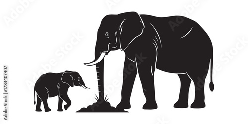 Silhouette of an elephant with its calf