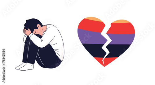 Sad person hugging knees next to a broken heart with colorful stripes.