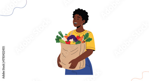 Young Black woman holding a reusable bag full of fresh, colorful vegetables and produce.