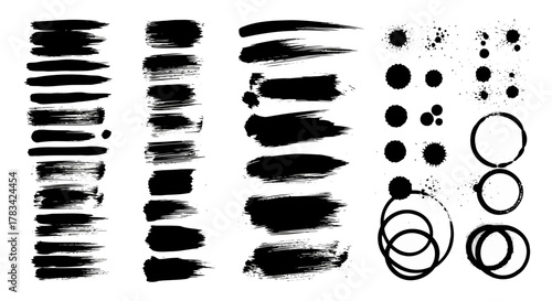Collection of black ink brush strokes paint splatters and grunge circles on a white background