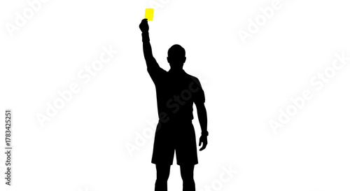 Referee silhouette raises a yellow card, a stern symbol of warning, foul, penalty, and adherence to rules in sports, competition, or game.