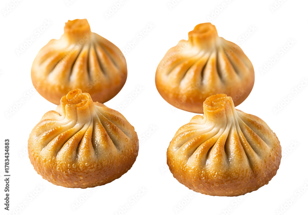 Obraz premium Four delicious khinkali dumplings with pleated tops isolated on transparent background