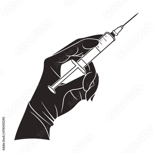hand holding a syringe
