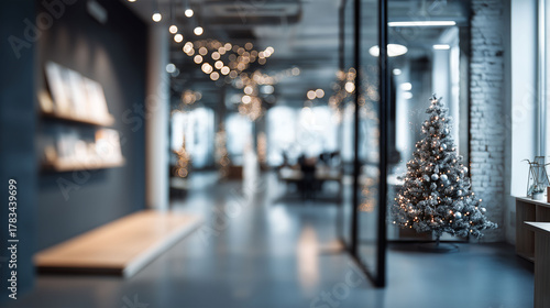 Festive Office Ambiance: The photo captures the calm interior of an modern office subtly decorated for a holiday season, with a Christmas tree adding warmth and joy to the workspace.