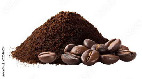 Pile of ground coffee next to roasted coffee beans
