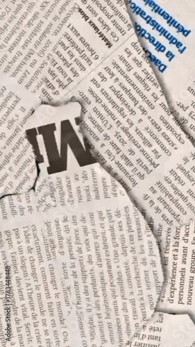 Conceptual collage with paper pieces of newspaper and the letter M representing media and information 4K motion animations