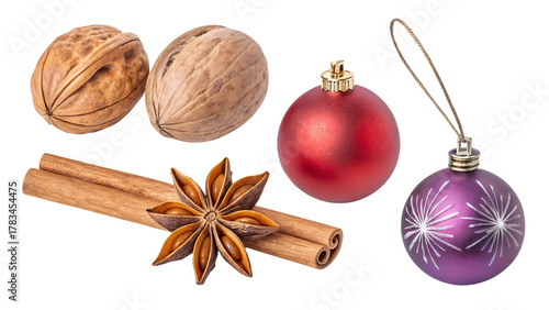 set of christmas decorations: walnut, anise star, cinnamon and christmas balls in red and purple isolated on white or transparent png
