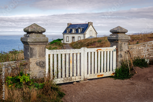 The Pointe du Millier Lighthouse (Maison Phare), near the village of Beuzec-Cap-Sizun, in Finistère, Brittany, France.