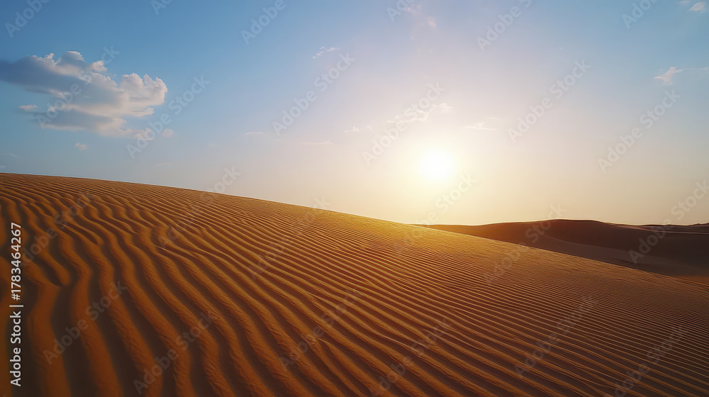 Naklejka premium Serene desert landscape with gentle sand dunes and warm sunset glow, evoking tranquility and peace