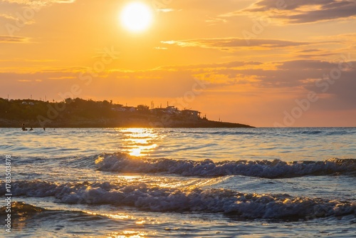 Sunset Over the Italian Sea: Golden Horizons and Tranquil Coastal Beauty
