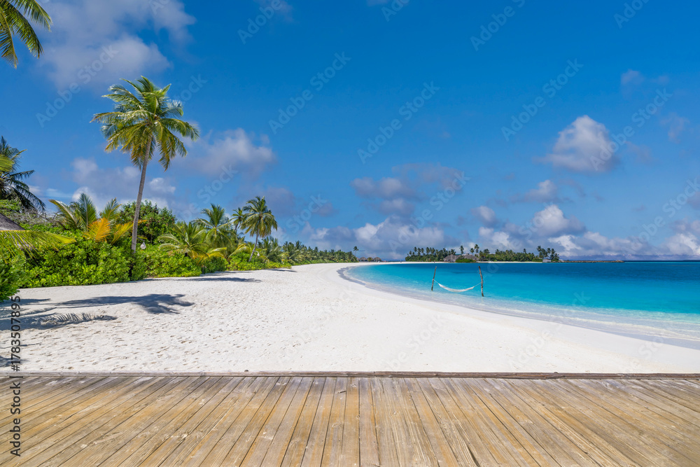 Obraz premium Untouched tropical coastline white sand beach extended wooden boardwalk tranquil blue ocean bright sunshine sky. Beautiful resort getaway destination perfect summer holiday escape backdrop tourism