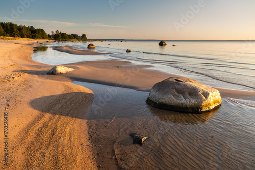 Sandy beach with boulders in Lahemaa National Park, Estonia.