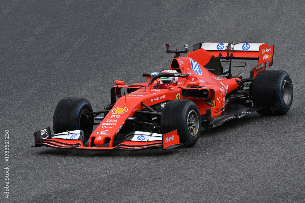 Obraz premium Scarperia; Italy - October 24th 2025: Ferrari SF90 ex Sebastian Vettel and Charles Leclerc in action during Ferrari World Finals 2025 at Mugello Circuit in Italy.