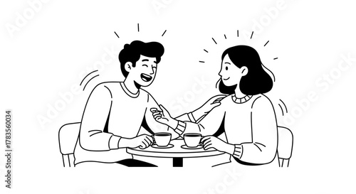 Two people smiling and talking at a table with coffee