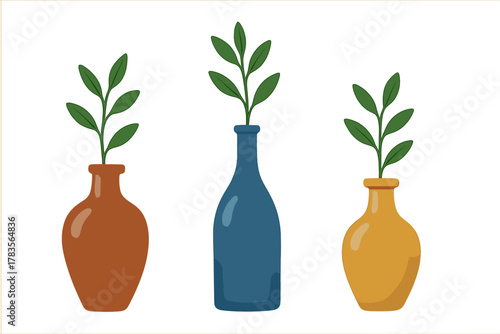 Three colorful ceramic vases holding simple green leafy branches in a minimalist style arrangement