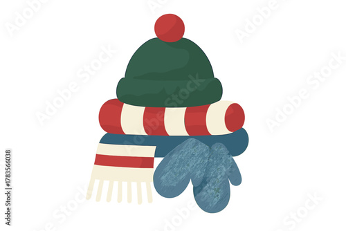 Cozy stack of colorful winter accessories: green knit hat, striped scarf, and blue mittens