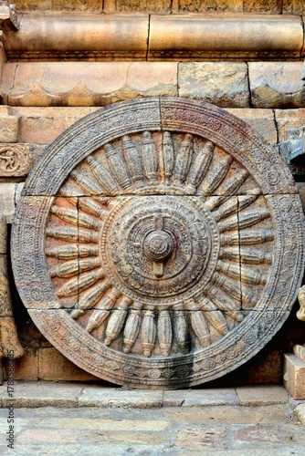 Ancient stone chariot wheel carving at the Airavatesvara Temple (UNESCO heritage site) in Darasuram, Tamil Nadu, showcasing the Chola dynasty’s remarkable craftsmanship and architectural detailing
