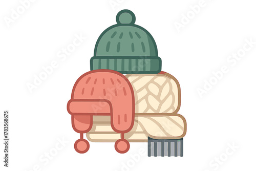 Cozy stack of winter hats and knitted scarf for cold weather protection